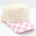 Cotton Checkered Blank Hats, a beige baseball cap with a pink and white checkered brim and a pink and white button on top.