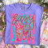 Easy Tiger DTF Heat Transfer, colorful tiger graphic design on a lavender T-shirt.
