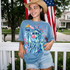 Brushstroke Lady Liberty DTF Heat Transfer, vibrant artistic depiction of Lady Liberty wearing sunglasses and blowing bubble gum, featuring pink and blue brushstroke details.