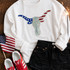 longhorn patriotic sequins applique patch on a white crewneck sweatshirt.