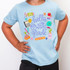 Hello Grade PURPLE DTF Heat Transfer, colorful school-themed design on a light blue t-shirt.