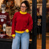 Blank Mockneck Sweatshirt — Preorder | Multiple Colors, young woman in red sweatshirt with yellow cuffs and collar, standing outside a store with apparel and autumn decor