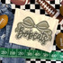 Camo Bow School Mascot DTF Heat Transfer, beige fabric with a camo bow and the word 'Captains' in decorative script design.