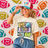 Retro Mascot Collage DTF Heat Transfer, colorful football-themed design on a woman's t-shirt featuring a lion, football helmet, goal net, and star accents.