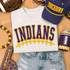 Indians Football Laces Embroidered Chenille Patch, embroidered appliqué patch on a white sweatshirt with purple and yellow football-themed embellishments.