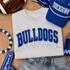 Royal blue Bulldogs varsity chenille iron-on patch with football lace embroidery for game day apparel, school spirit wear, and boutique clothing.