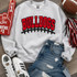 Bulldogs Red & Black Chenille Football Patch, close-up view of the embroidered patch on a grey sweatshirt surrounded by sneakers, jeans, football, foam finger, and cheer pom-poms.