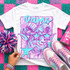 Retro Bold Mascot Variations DTF Heat Transfer, vibrant colorful design of a wildebeest with star-shaped sunglasses on a white T-shirt, surrounded by pink, purple, and blue accessories.
