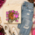 Pink Glitter Mascot - 62 teams - DTF Heat Transfer, featuring a colorful design of a warrior mascot with the text 'Let's Go Warriors' on a beige sweatshirt, surrounded by casual clothing and accessories.