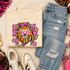 Pink Glitter Mascot - 62 teams - DTF Heat Transfer, a vibrant sweatshirt with a lion mascot graphic and playful pink star accents, laid out on casual jeans with distressed details, near stylish sneakers and accessories.