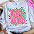 Retro Lotty Dotty School Mascot DTF Heat Transfer, colorful and vibrant design with bold text and star graphics on a gray sweatshirt.