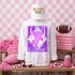Loud & Proud Mascot DTF Transfers | Retro School Spirit Mascot Collection, featuring a white sweatshirt with a purple unicorn and the words "Loud & Proud," displayed with a pink football, pink folded towels, pink accessories, and a pink and white checkered background.