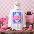 Loud & Proud Mascot DTF Transfers | Retro School Spirit Mascot Collection, colorful neon-style hoodie with a fierce crocodile mascot and bold text, surrounded by pink themed cheer accessories and football props, displayed on a wooden table against a pink checkered background.