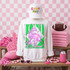 Loud & Proud Mascot DTF Transfers | Retro School Spirit Mascot Collection, display of a white sweatshirt with a loud mascot illustration, a white cap with colorful lettering, and pink themed sports accessories on a pink checkered background.