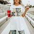 Huskies mascot DTF transfer with marquee-style lettering featuring cheetah print and gold bulb accents