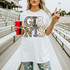 Neutral Marquee Mascot A-P DTF Transfers | School Spirit Mascot Collection, person holding a Coca-Cola cup and wearing a shirt with decorative marquee letters spelling 'GATORS' on a stadium track field.
