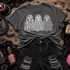 Three patterned ghost trio DTF transfer with floral, leopard, and polka dot print designs on a dark heather shirt