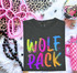 Wolf Pack mascot DTF transfer in stacked bright neon watercolor brush lettering with paint splatter accents