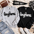 Black Longhorns fluffy script patch on a light gray sweatshirt beside a white Longhorns fluffy script patch on a black sweatshirt.