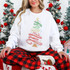 Merry Christmas tree DTF transfer with red, gold, and green ombré script lettering shaped like a tree and topped with a star