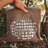 Thankful pumpkin-shaped DTF transfer with black and white checkered lettering and a leopard print bow stem accent