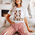AL state abbreviation DTF transfer with vintage Santa Claus faces and polka dot pattern filling the letters