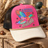 Rather Be Hunting DTF transfer with colorful patchwork mallard duck in flight and black star accents Shown on a hot pink front panel, cream bill, black mesh back, tan rope trucker hat.