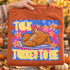 Talk Turkey To Me Thanksgiving DTF transfer with cartoon roasted turkey chatting on a retro telephone, surrounded by orange stars on a blue starred background Shown on a Yam t-shirt.