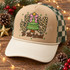 Joy to the World Christmas DTF transfer with leopard-print J and Y, a layered green Christmas tree topped with a gold star and pink bow, and cursive lettering with green stars Shown on a camel leopard-tan front / cream rope and bill / forest green two-tone mesh back trucker hat.