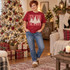 Tis the Season DTF transfer with three lace-textured ivory Christmas trees topped with lace stars over red-and-white gingham lettering Shown on a Crimson t-shirt.