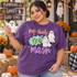 He Did the Mash Halloween DTF transfer with two friendly white ghosts, colorful stars, and playful patterned script lettering Shown on a Grape t-shirt.