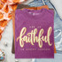 God Is Faithful In Every Season DTF transfer in gold script lettering on a purple shirt, fall faith design