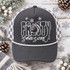 Frosty Season DTF transfer with chalky white line-art snowman peeking through FROSTY lettering and script season text, surrounded by sketchy snowflakes Shown on a charcoal grey front panel with white rope and grey-and-white checkered mesh back trucker hat.