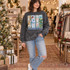 It's The Most Wonderful Time Of The Year Christmas DTF transfer with embroidered-yarn style mouse king, ballerina, nutcracker soldier, and pom-pom pine tree panels Shown on a Charcoal crewneck sweatshirt.