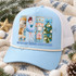 It's The Most Wonderful Time Of The Year Christmas DTF transfer with embroidered-yarn style mouse king, ballerina, nutcracker soldier, and pom-pom pine tree panels Shown on a Ice blue front panel with cream rope and white mesh back trucker hat.