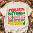 Probably Just Gonna Jingle Some Of The Way Im Tired Christmas DTF transfer in stacked polka-dot varsity lettering with hand-drawn ornaments, bell, candy cane, stocking, stars, and mini Christmas trees Shown on a Ivory t-shirt.