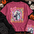 Cutesy horror DTF transfer featuring a creepy clown gripping a cleaver in a pink scalloped frame with bow and stars