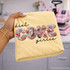 Diet Coke Girlie DTF transfer with collage-style Diet Coke can and bottle print letters and black script lettering on a yellow shirt