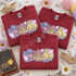 Pennywise Pastel Floral DTF Transfer | Creepy Cute Horror Halloween Design, pastel pink and purple floral Pennywise artwork displayed on three folded burgundy T-shirts with a yellow raincoat, balloons, daisies, and Halloween-themed props