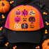 Retro block-print jack-o-lantern grid DTF transfer with nine pink, orange, and purple pumpkins featuring stars, moons, bats, a skeleton, and candy corn designs Shown on a orange front panel, black bill, hot pink mesh back with black rope trucker hat.