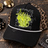 Grunge-style Frankenstein head design DTF transfer with black and white sketchy stars, neon yellow lightning bolt, and distressed chartreuse texture framed by polka dot accents Shown on a black foam front panel, black bill, white rope, leopard print mesh back trucker hat.