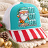 Watercolor Santa gnome DTF transfer with leopard and teal patchwork coat, snow-capped HO HO HO lettering, and Merry Christmas script on plaid background Shown on a Turquoise front panel, white mesh back, red and white striped bill trucker hat.