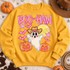 BOO-HAW Halloween DTF transfer with a hand-painted cowboy ghost in a brown western hat, glowing yellow moon, jack-o-lanterns, pink bats, and stars Shown on a Gold crewneck sweatshirt.