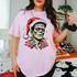 Green flat-top horror monster with neck bolts wearing a Santa hat DTF transfer with red roses