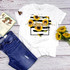 Sunflower Heart Mama Sublimation Transfer, designed with sunflowers and the word 'Mama' on a white T-shirt, decorated with a sunflower bouquet and butterfly accents.