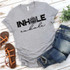 Inhale Exhale Lotus Flower Screen Print Transfer, gray T-shirt with black and floral graphic design on a flat surface, paired with blue denim jeans and brown sandals with orange straps.