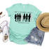 Don't Let Me Become A Statistic Screen Print Transfer T-Shirt, teal graphic T-shirt with silhouette figures and hashtag emphasizing anti-human trafficking awareness.