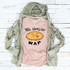 90's Version WAP FINAL STOCK Screen Print Heat Transfer T-Shirt with a pie graphic and playful text, laid on a white wooden background with a light green hoodie.