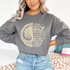 I See Trees of Green CREAM Screen Print Heat Transfer T-shirt, beige-colored quote and tree design on gray sweatshirt.