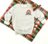 Believe In The Magic Rainbow Pocket Screen Print Heat Transfer, a colorful rainbow design with stars on a gray sweatshirt.